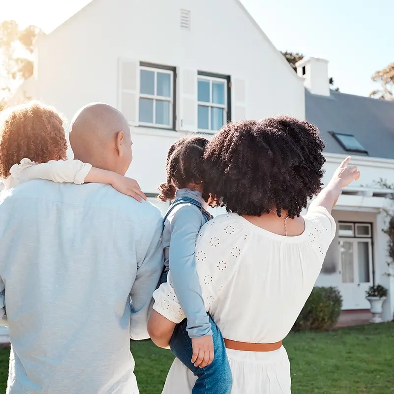 home owners in front of home